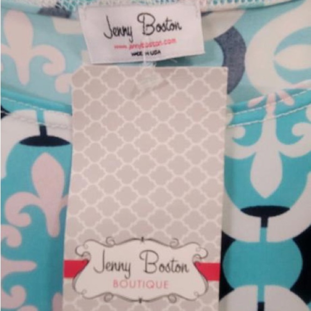 Jenny Boston Boutique sleeveless torquoise dress with pretty design.